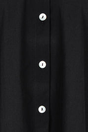 Product shot of the Studio Oversize Cotton Shirt in colour Ebony (Black), detail