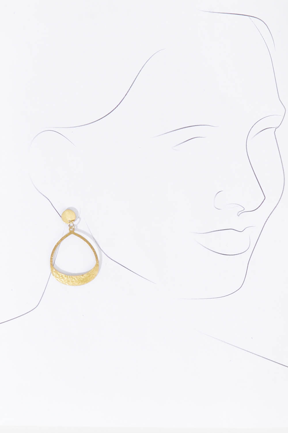 A model wearing the Studio Teardrop Earring in colour Gold (Metallics), from the front, showing the whole outfit