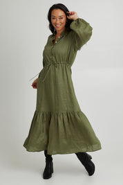 Model Katie wearing size S of the Nama Shirt Dress in colour Fern (Green), from the front, showing the whole outfit
