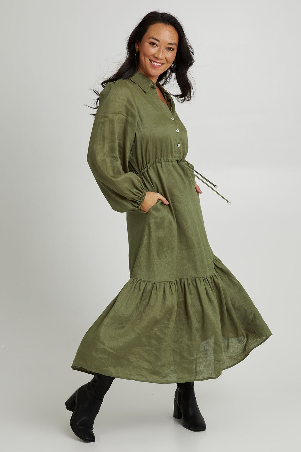 Model Katie wearing size S of the Nama Shirt Dress in colour Fern (Green), from the front, showing the whole outfit