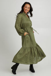 Model Katie wearing size S of the Nama Shirt Dress in colour Fern (Green), from the front, showing the whole outfit