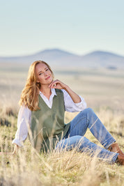 Model Katie wearing size S of the Nakako Vest in colour Moss (Green), from the front, showing the whole outfit