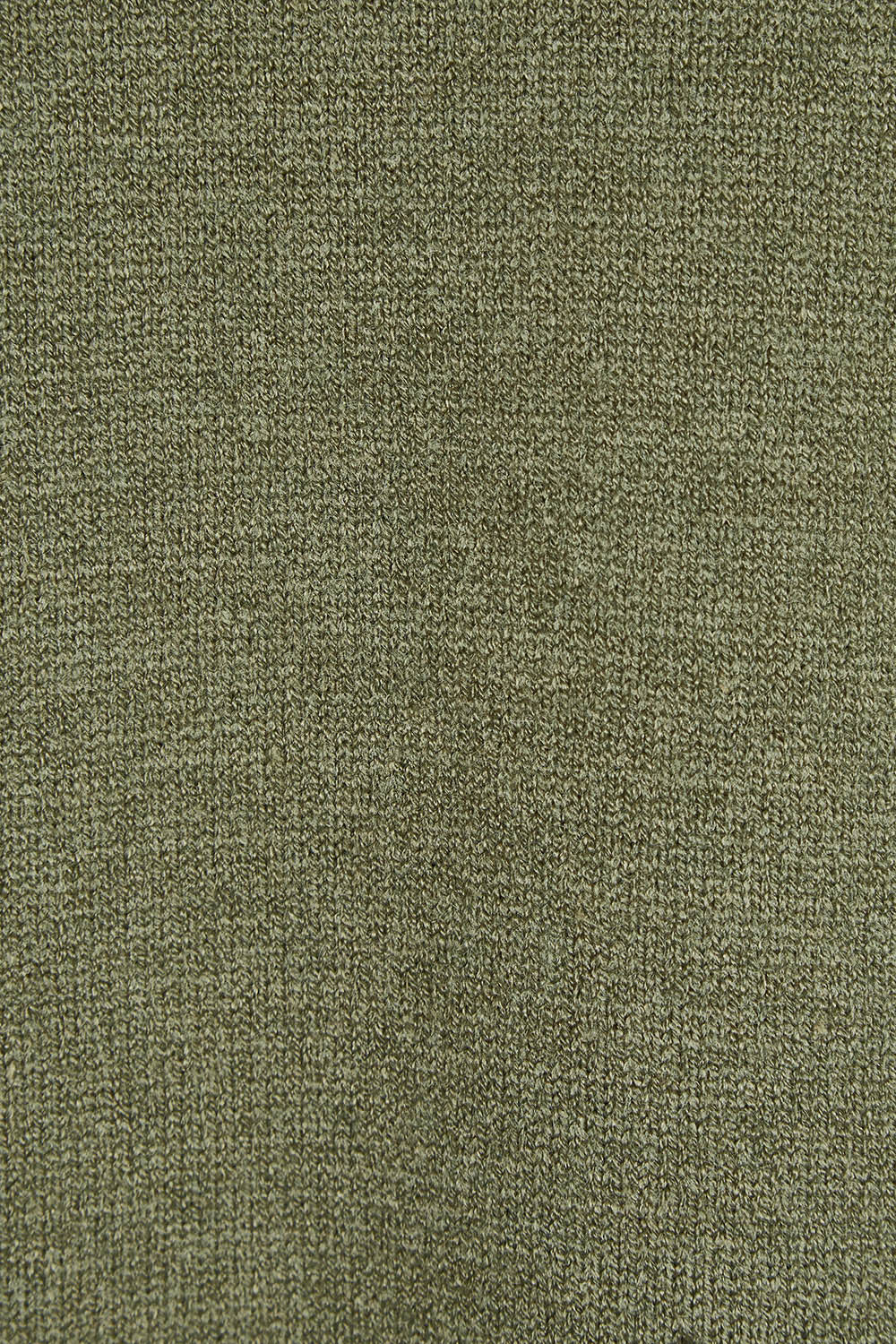 Product shot of the Nakako Vest in colour Moss (Green), detail