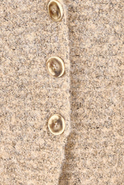 Product shot of the Folie Button Vest in colour Oat, detail