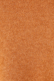 Product shot of the Avino Poncho in colour Tobacco, detail