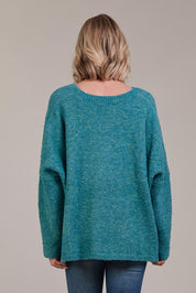 A model wearing the Folie Relaxed Knit in colour Largo (Blue), from the back