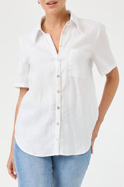 A model wearing the Studio Linen Short Sleeve Shirt in colour White (White), from the front, cropped image