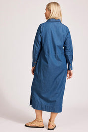 A model wearing the Melenia Denim Collared Dress in colour Indigo (Blue), from the back