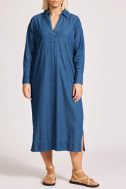 A model wearing the Melenia Denim Collared Dress in colour Indigo (Blue), from the front, cropped image
