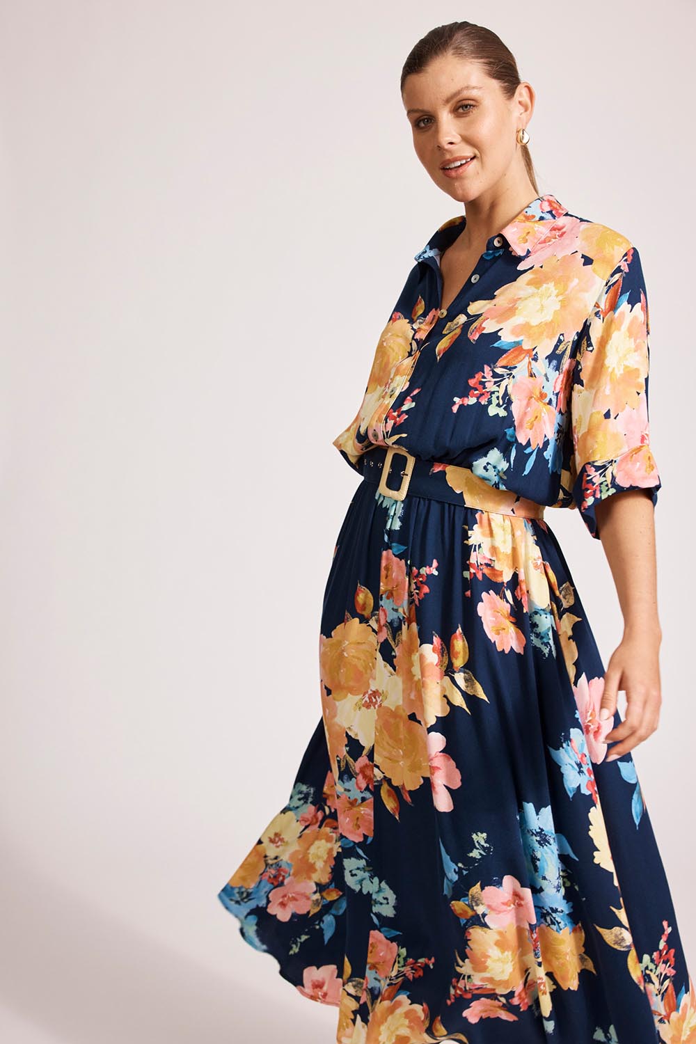 A model wearing the Parisio Belt Shirt Dress in colour Indigobloo, from the front, cropped image