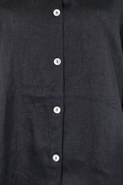 Product shot of the Studio Linen Button Top Jacket – Black in colour Black, showing detail