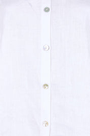 Product shot of the Studio Linen Button Top Jacket – White in colour White, showing detail