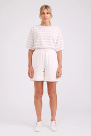 Model Genericm wearing size sample of the Studio Linen Bermuda Short – White in colour White, from the front