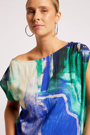 Model Genericm wearing size sample of the Palmera Top – Seafoam in colour Seafoam, from an angle