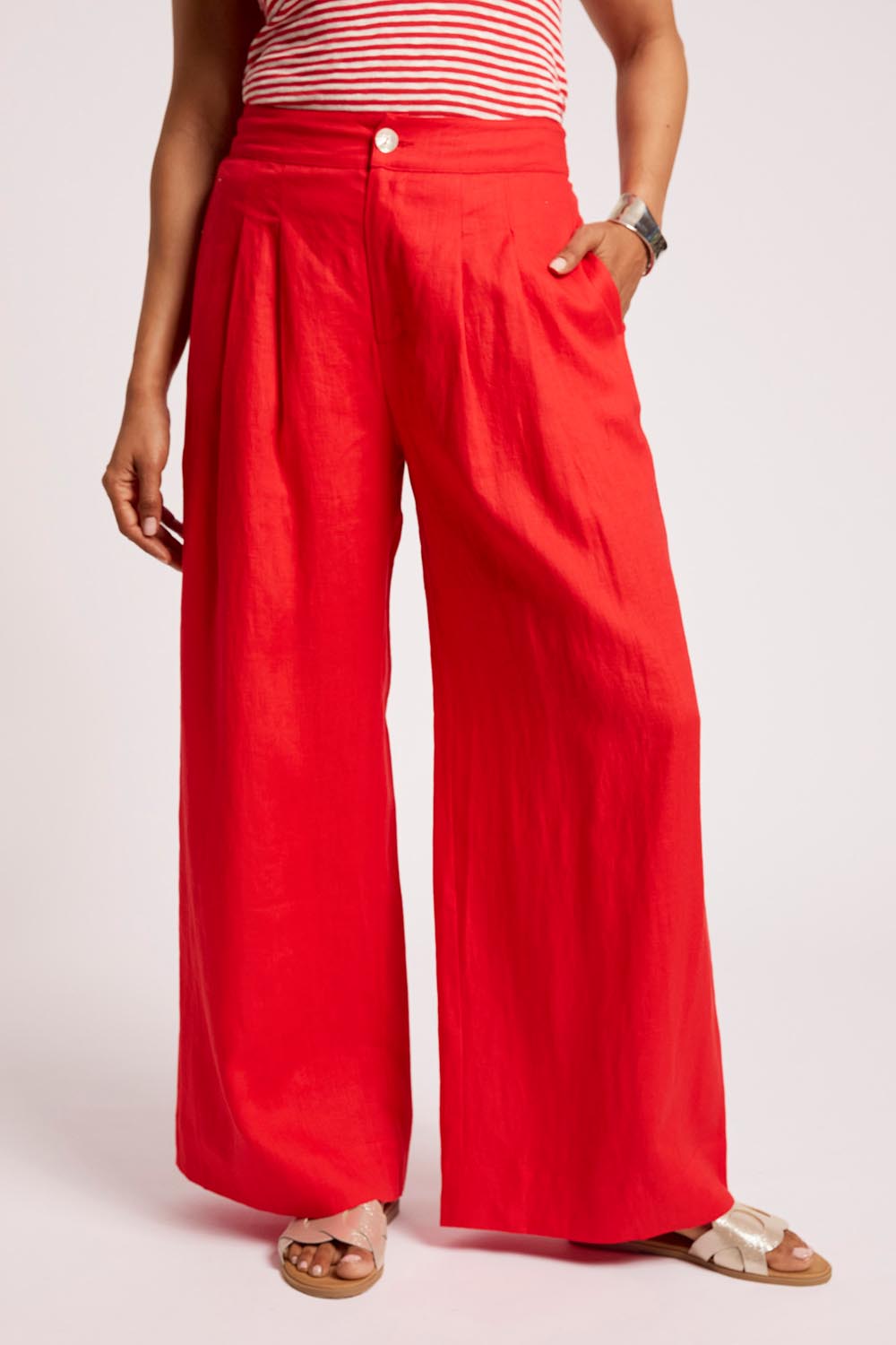 Model Genericm wearing size sample of the Cove Palazzo Pant – Aperol in colour Aperol, from the front