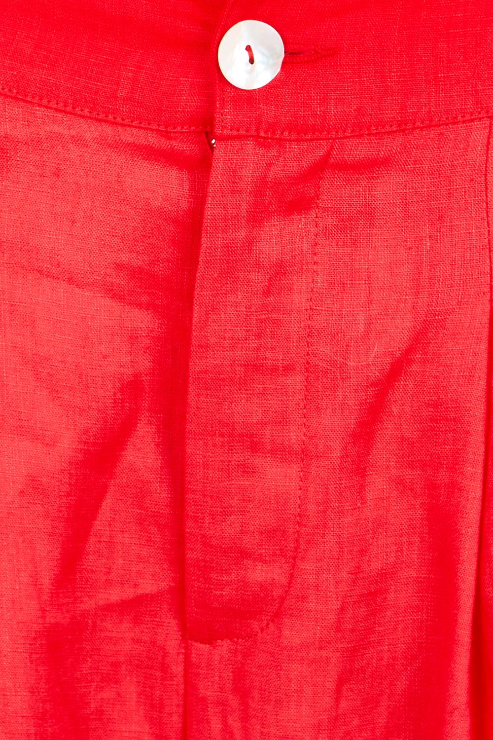 Product shot of the Cove Palazzo Pant – Aperol in colour Aperol, showing detail