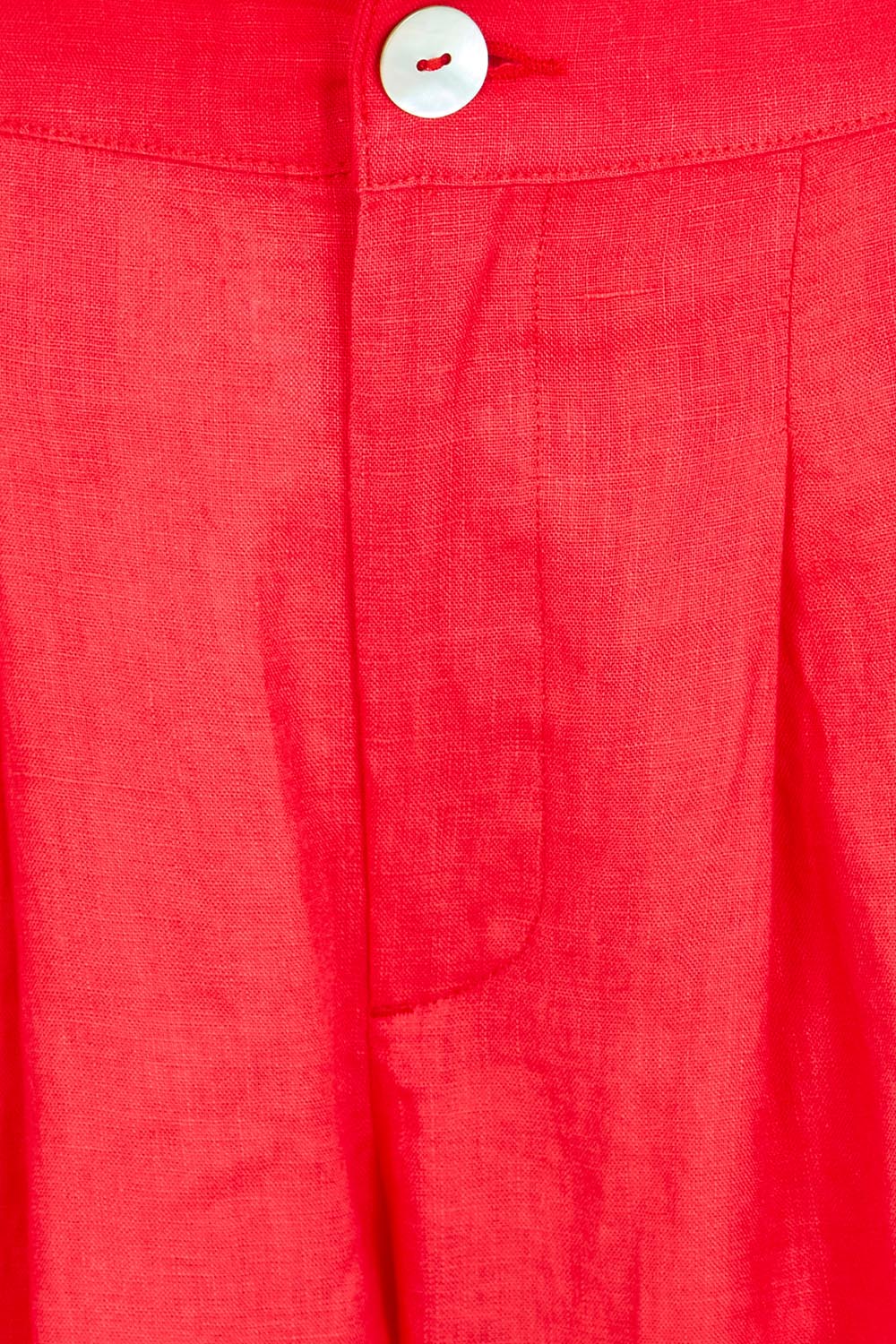 Product shot of the Cove Linen Palazzo Pant – Aperol in colour Aperol, showing detail