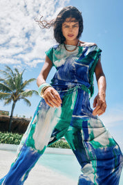 Model Genericm wearing size sample of the Palmera Pant – Seafoam in colour Seafoam, from the front