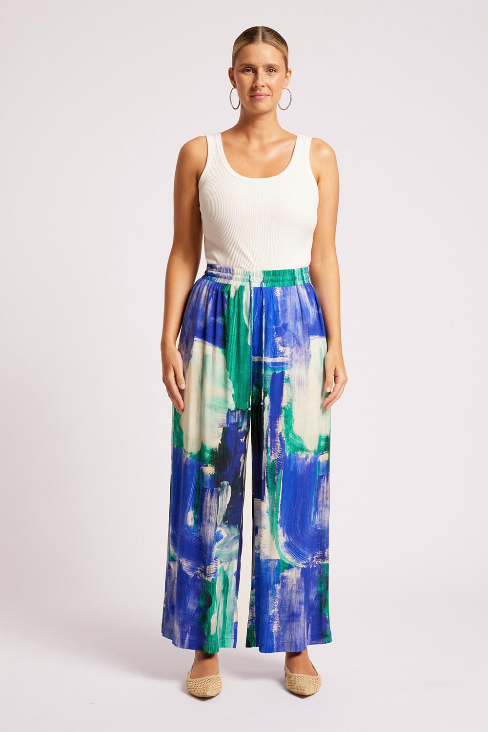 Model Genericm wearing size sample of the Palmera Pant – Seafoam in colour Seafoam, from the front