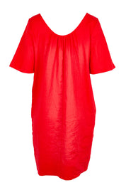 Product shot of the Cove Dress – Aperol in colour Aperol, from the back