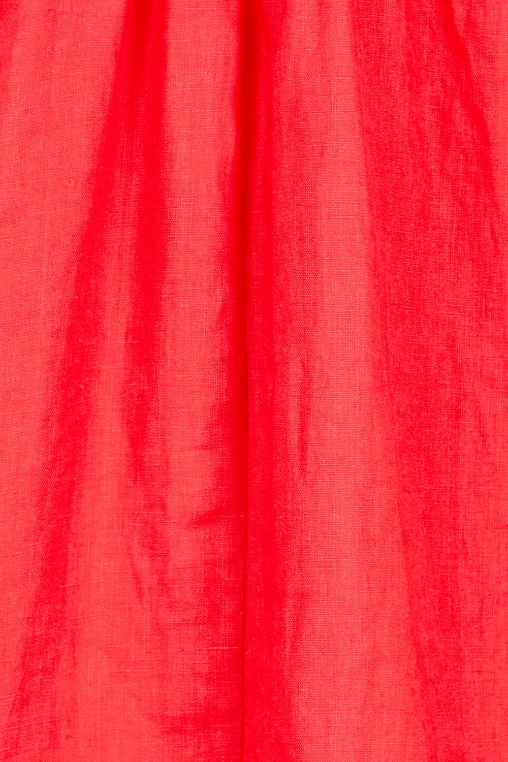 Product shot of the Cove Dress – Aperol in colour Aperol, showing detail