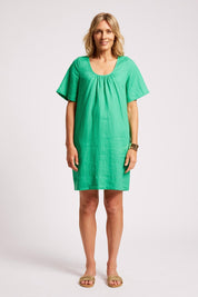 Model Genericm wearing size sample of the Cove Dress – Jade in colour Jade, from the front