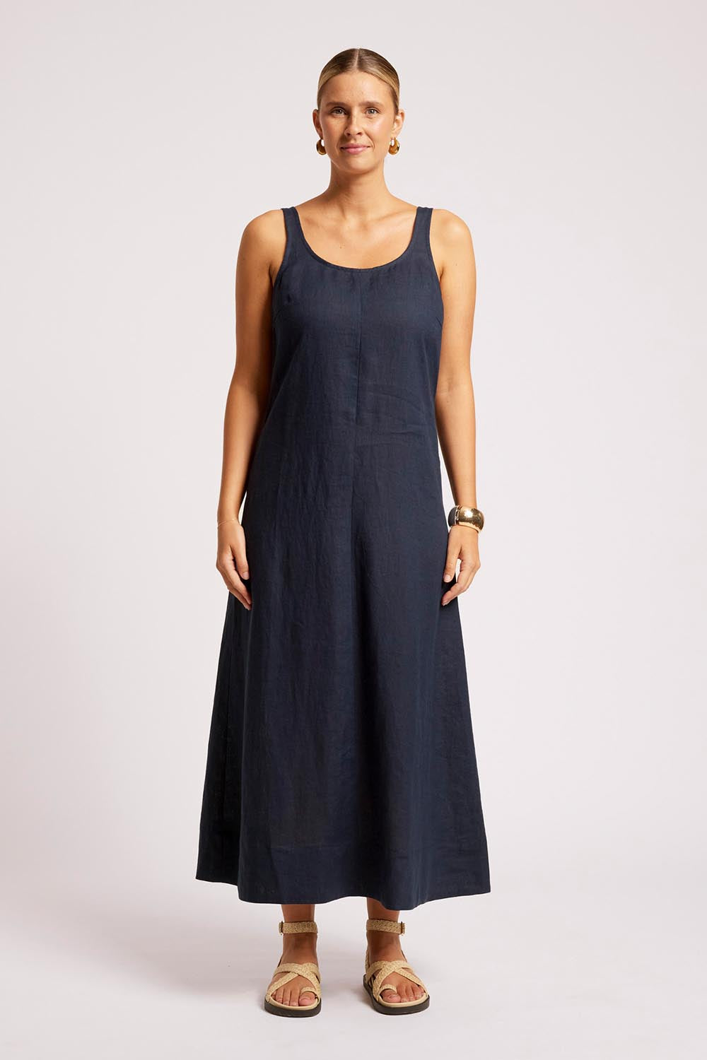Model Genericm wearing size sample of the Cove Tank Maxi Dress – Indigo in colour Indigo, from the front