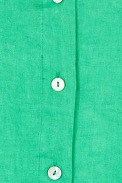 Product shot of the Cove Linen Maxi Dress – Jade in colour Jade, showing detail