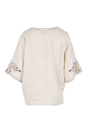 Product shot of the Maris Top – Tusk in colour Tusk, from the back
