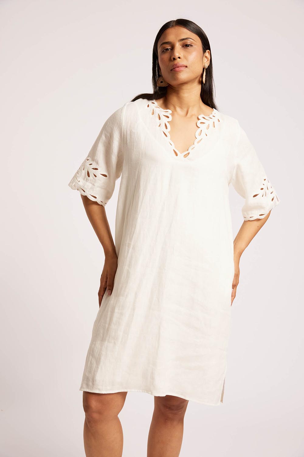 Model Genericm wearing size sample of the Maris Dress – Tusk in colour Tusk, in a cropped view