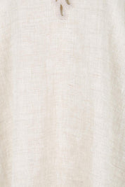 Product shot of the Maris Dress – Tusk in colour Tusk, showing detail