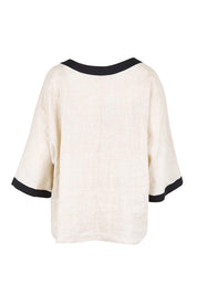 Product shot of the Maris Relaxed Splice Top – Tuskblack in colour Tuskblack, from the back