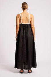 Model Genericm wearing size sample of the Maris Splice Tank Maxi Dress – Blacktusk in colour Blacktusk, from the front