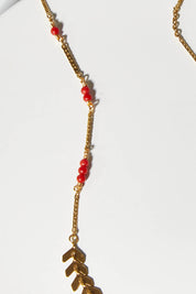 A model wearing size OneSize of the Desert Wildflower Necklace in colour Gold (Metallics), from the front, showing the whole outfit