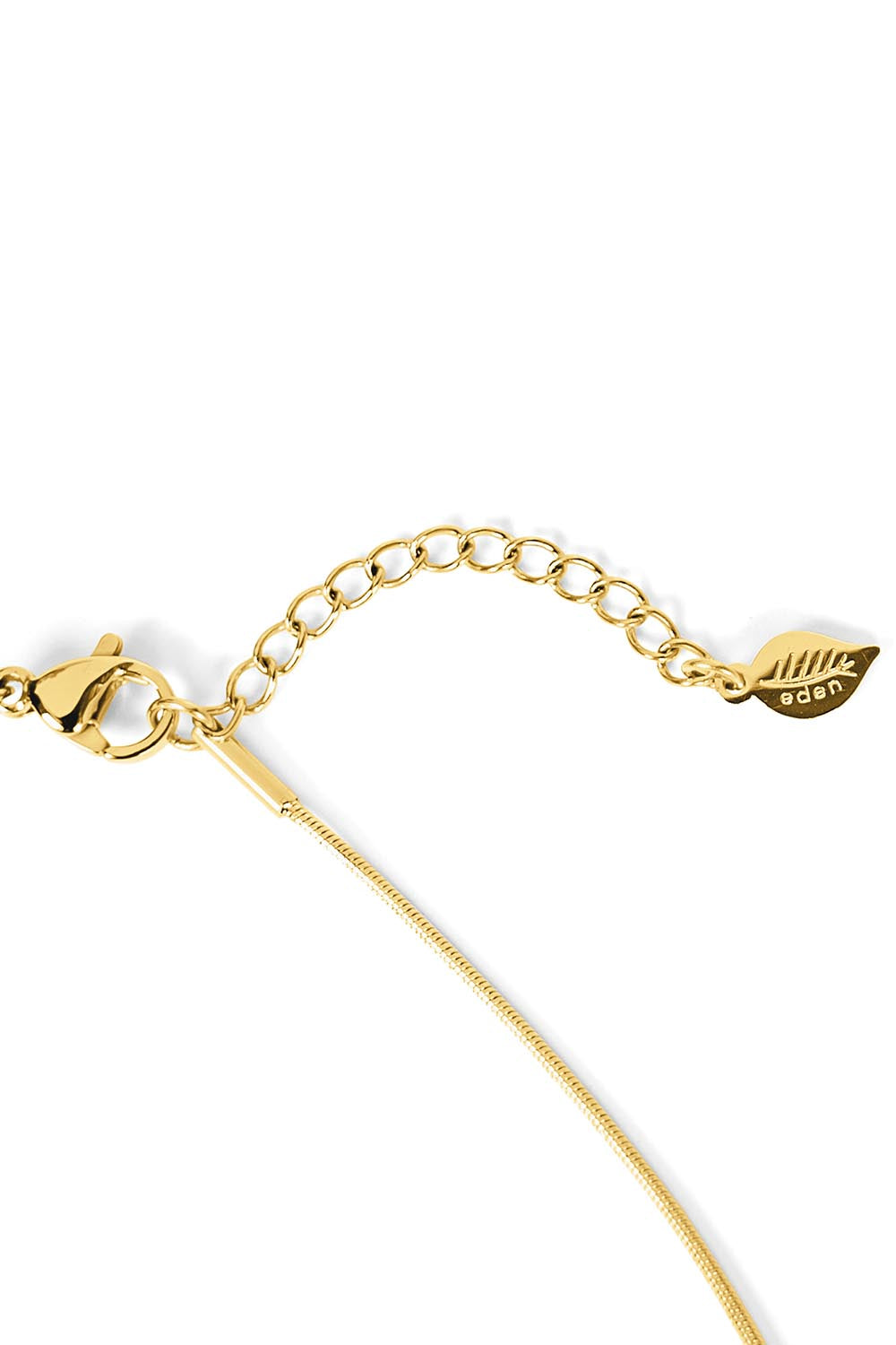 Product shot of the Radicle Drop Necklace in colour Gold (Metallics), detail