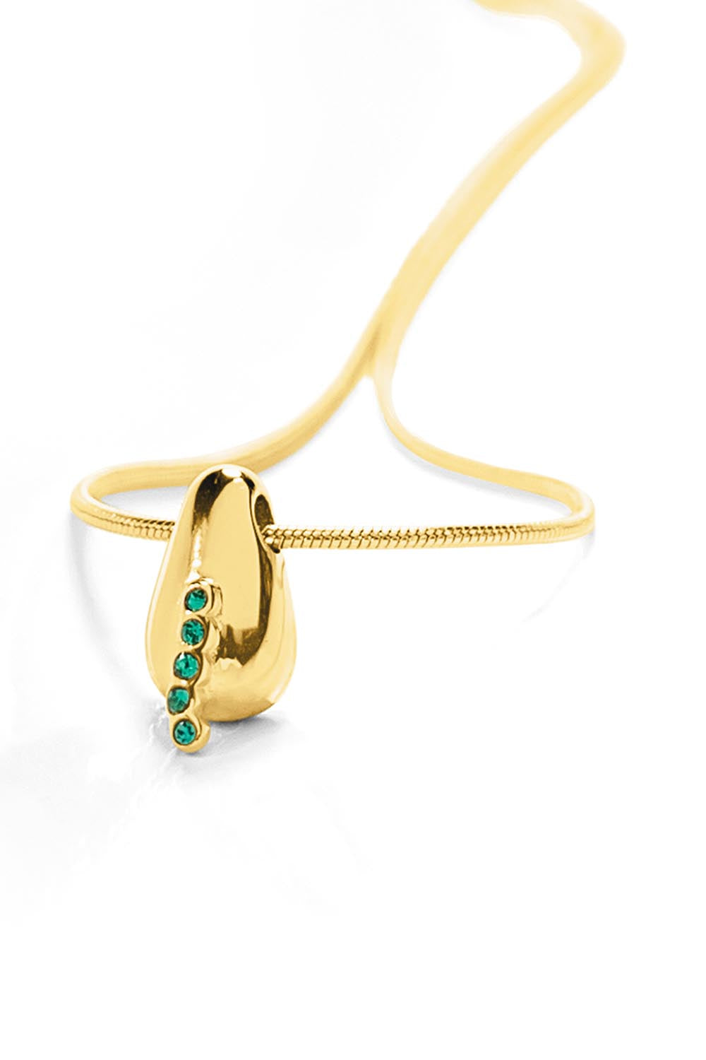 Product shot of the Radicle Drop Necklace in colour Gold (Metallics), detail