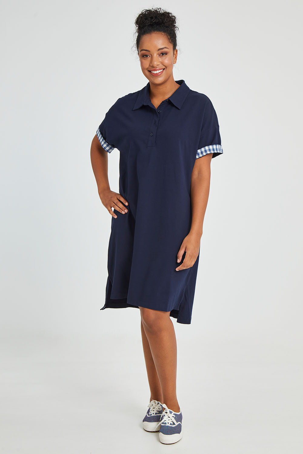 Model Noli wearing size 14 of the Grace Polo Dress in colour Drksapp (Blue), from the front, showing the whole outfit