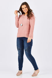 Model Tia wearing size 14 of the Maple Knit in colour PinkMarle (Pink), from the front, showing the whole outfit