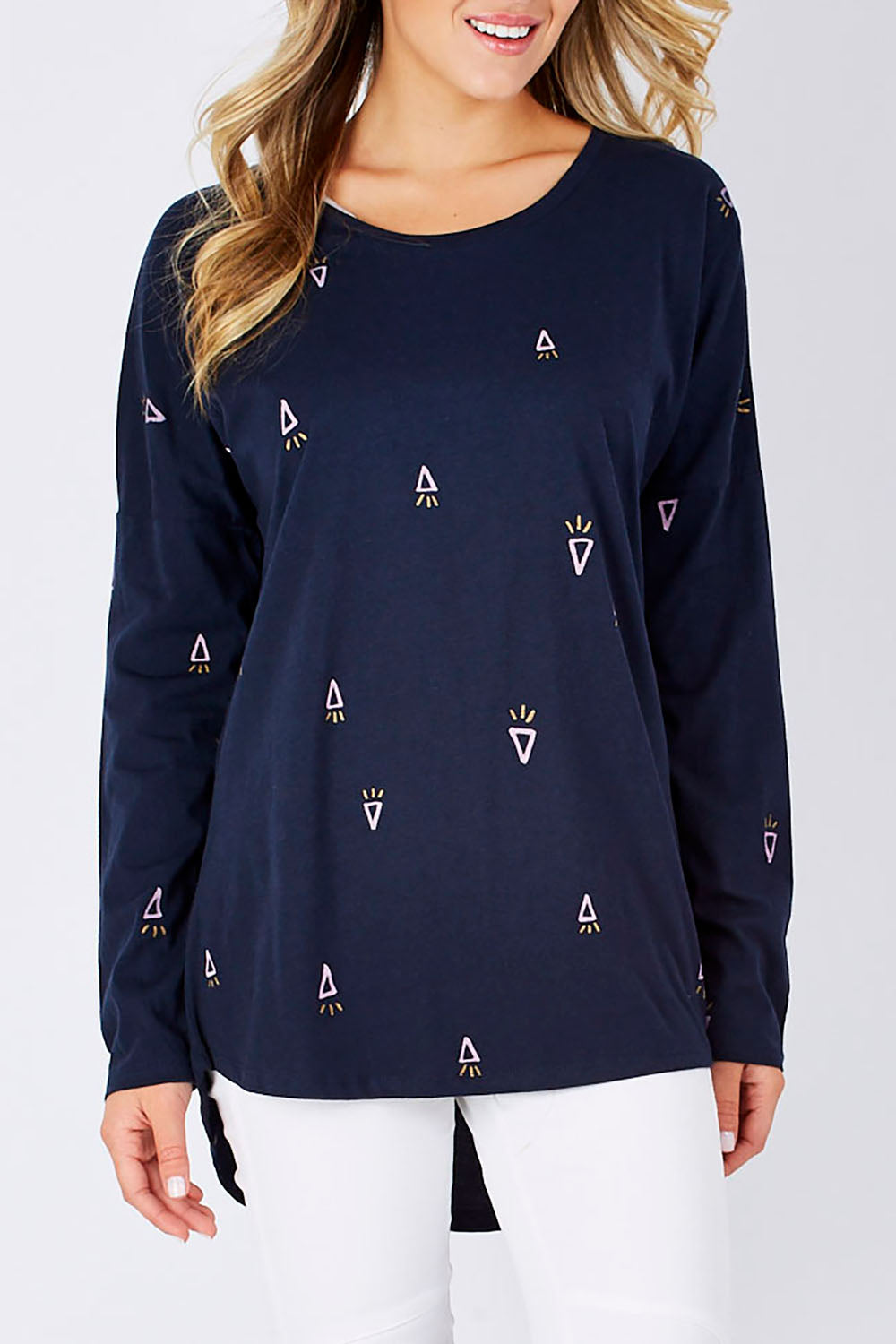 Model Yasmin wearing size 10 of the Livvie Long Sleeve Tee in colour Navy (Blue), from the front, cropped image