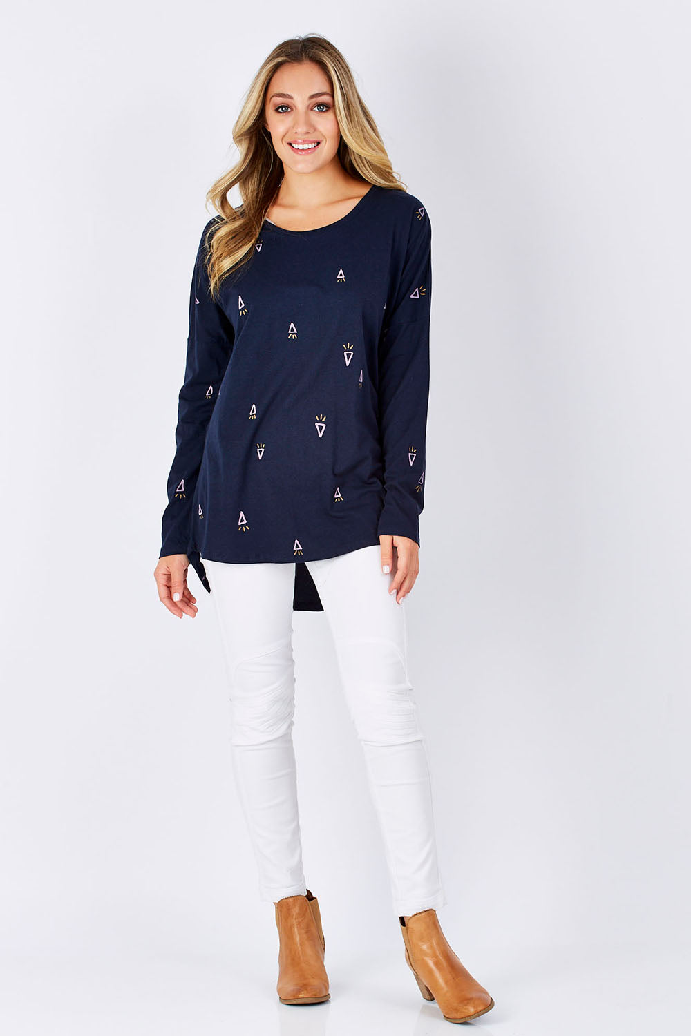 Model Yasmin wearing size 10 of the Livvie Long Sleeve Tee in colour Navy (Blue), from the front, showing the whole outfit