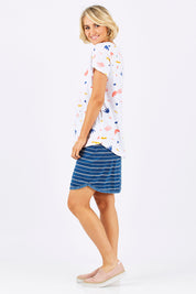 Model Emma wearing size 10 of the Go My Way Skirt in colour Chambray (Blue)