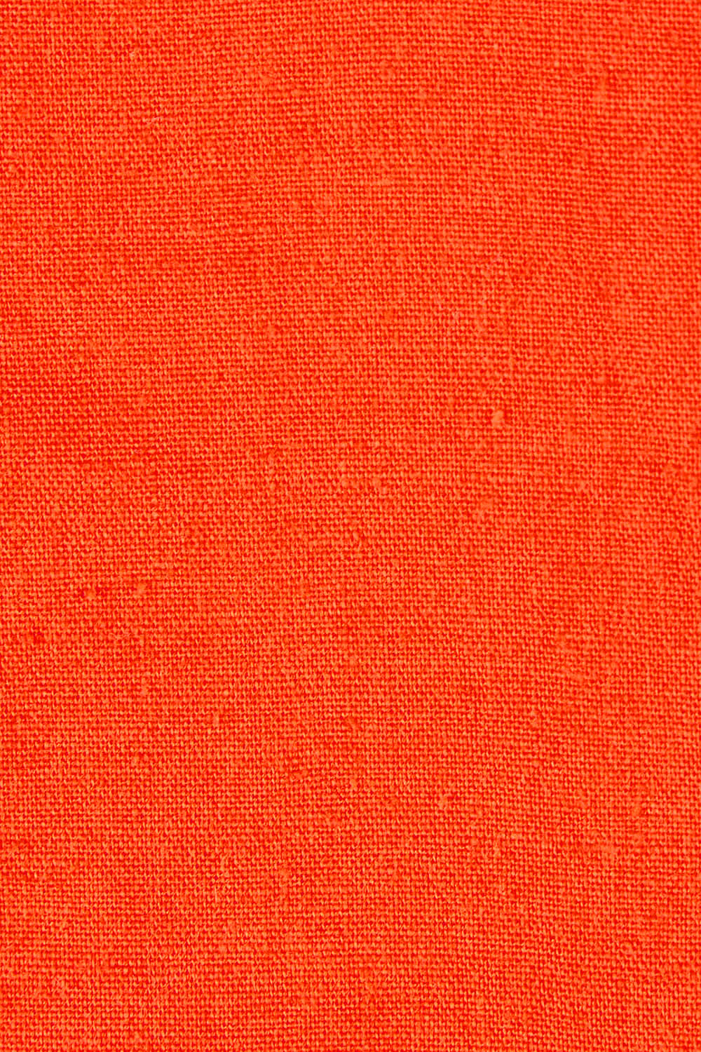 Product shot of the Rosa Top in colour Tangello (Red), detail