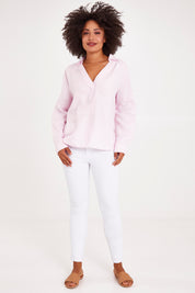 Model Olivia wearing size 10 of the Blair Open Neck Shirt in colour Blossom (Pink), from the front, showing the whole outfit