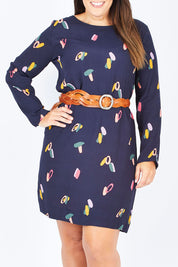 Model Stacey wearing size 12 of the Falling Sherbet Dress in colour Navy (Blue), from the front, cropped image