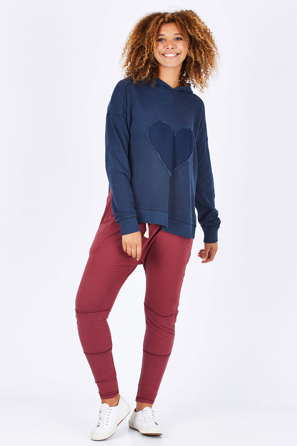 Model Summer wearing size 10 of the Weekend Picnic Pant in colour Burgandy (Purple), from the front, showing the whole outfit