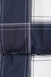 Product shot of the Cedar Check Puffer Vest in colour Navycheck (Blue), detail