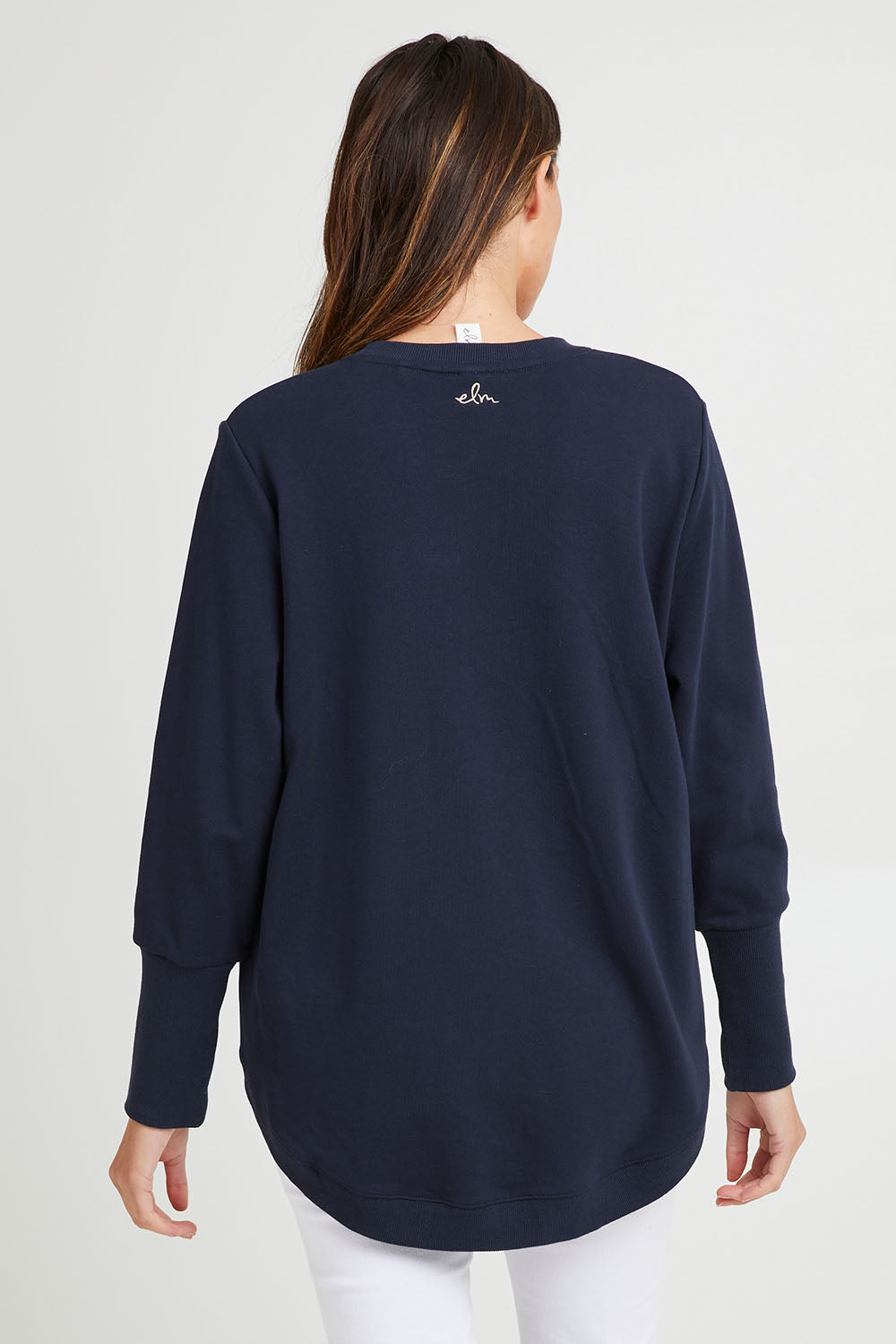 Model Madeline wearing size 10 of the Panorama Crew in colour Drksapp (Blue), from the back