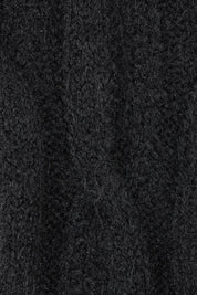 Product shot of the Tallulah Cable Knit in colour Black (Black), detail