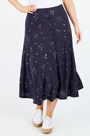 Model Jess wearing size 14 of the Celestial Skirt in colour Navy (Blue), from the front, cropped image