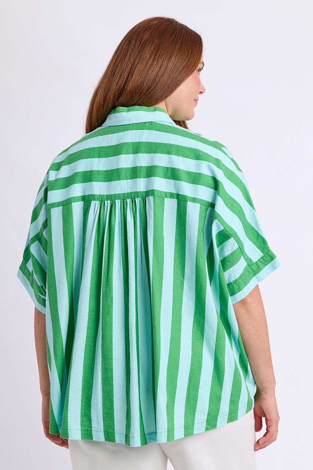 Model Genericm wearing size sample of the Palermo Stripe Shirt – Greenblue in colour Greenblue, from an angle